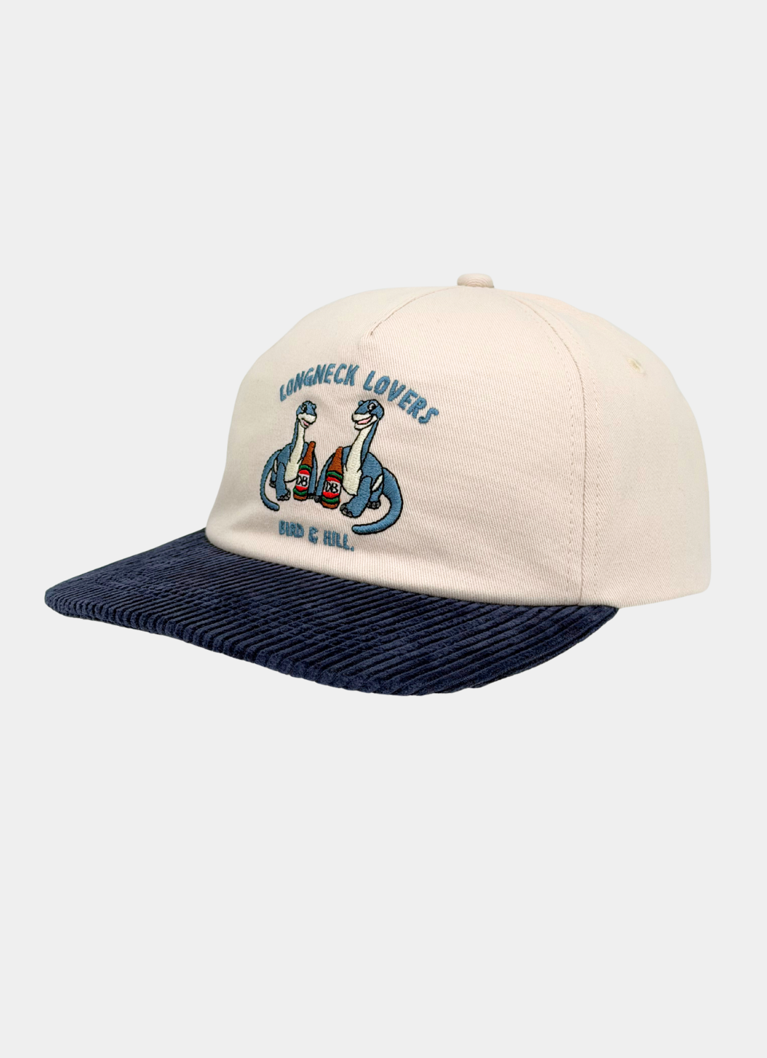 Side view of the Bird & Hill Longneck Lovers 5 Panel corduroy and cotton hat featuring dinosaur and longneck beer artwork.