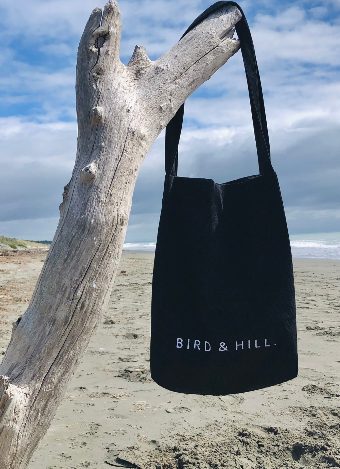 Black corduroy tote bag by Bird & Hill.